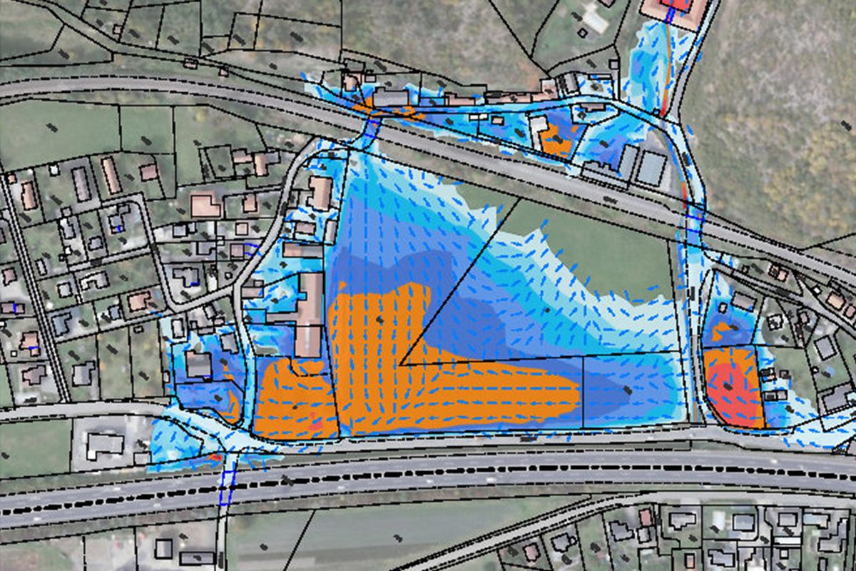 Die Karte zeigt eine Landschaft mit Wasserlinien, Bebauungsplänen und Fließrichtungen in bunten Farben.