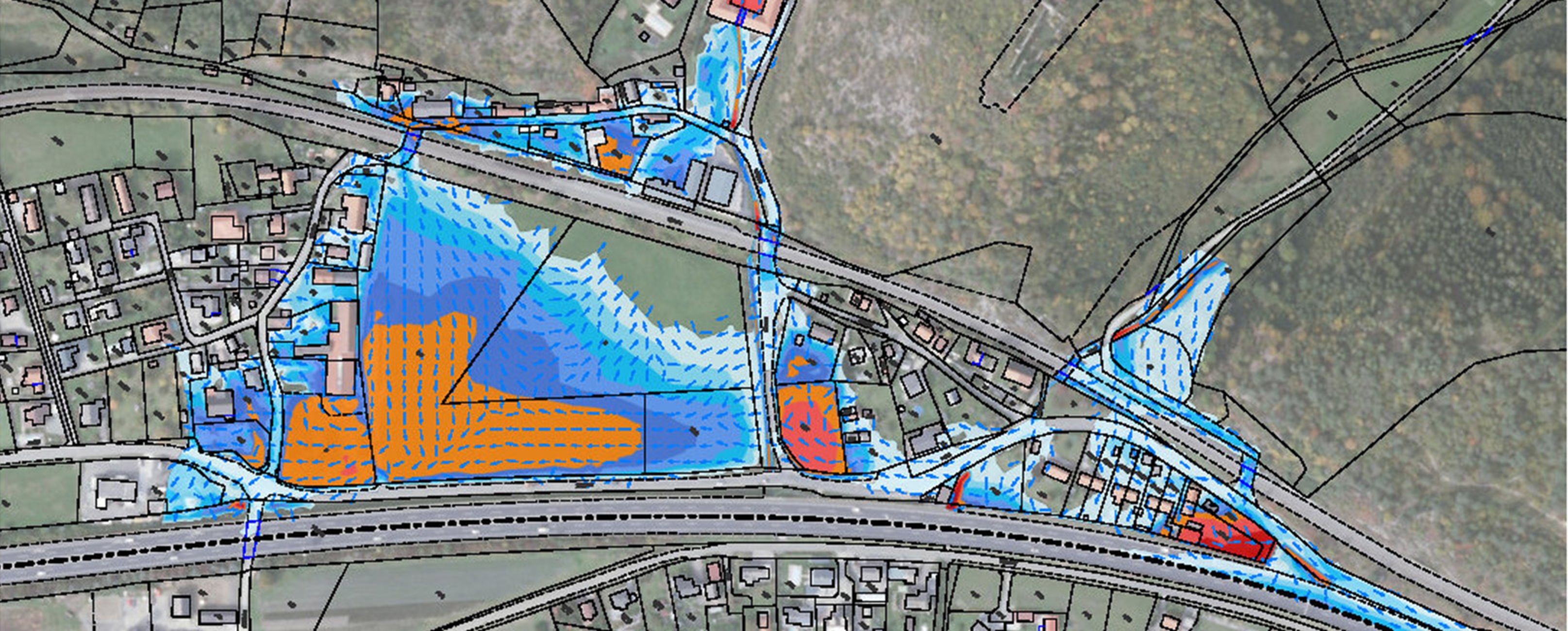 Die Karte zeigt eine Landschaft mit Wasserlinien, Bebauungsplänen und Fließrichtungen in bunten Farben.