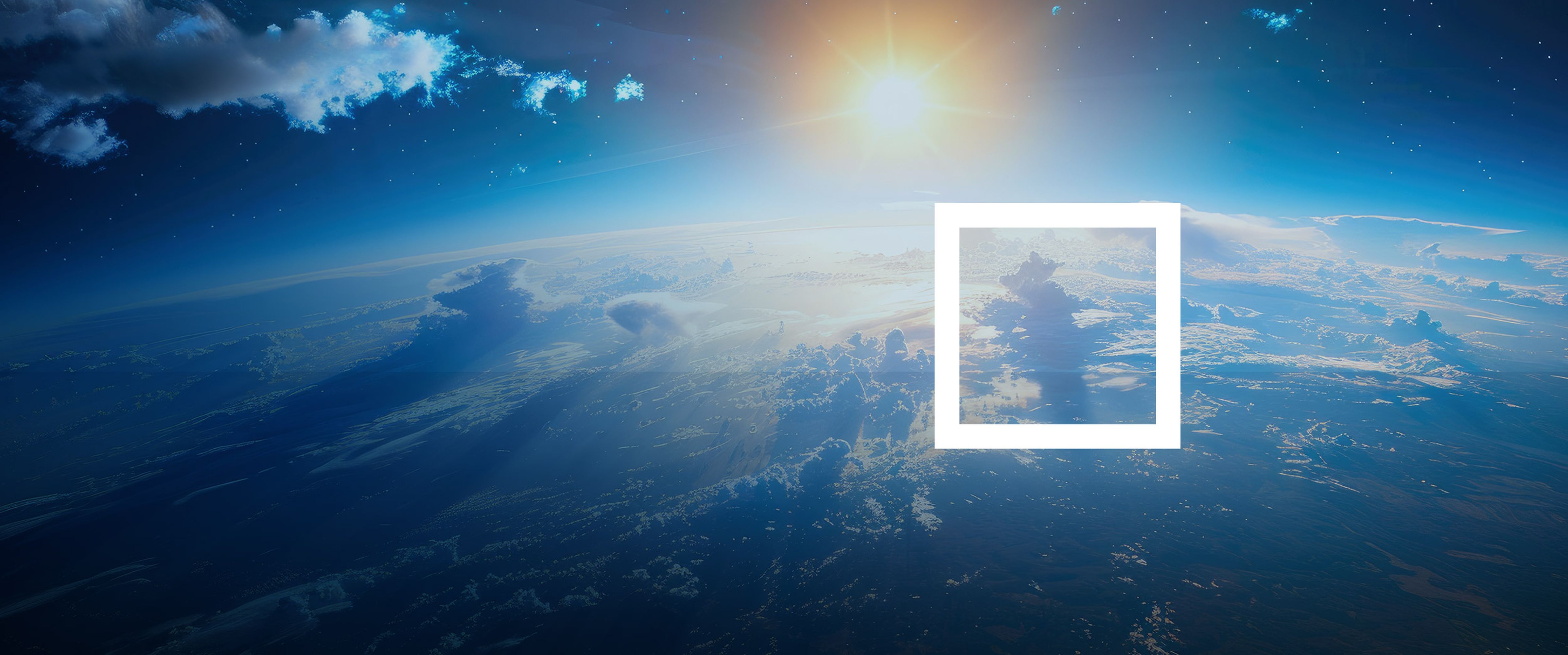 A view of the earth from space with a radiant sun and a clear sky. Clouds and rays of light are visible.